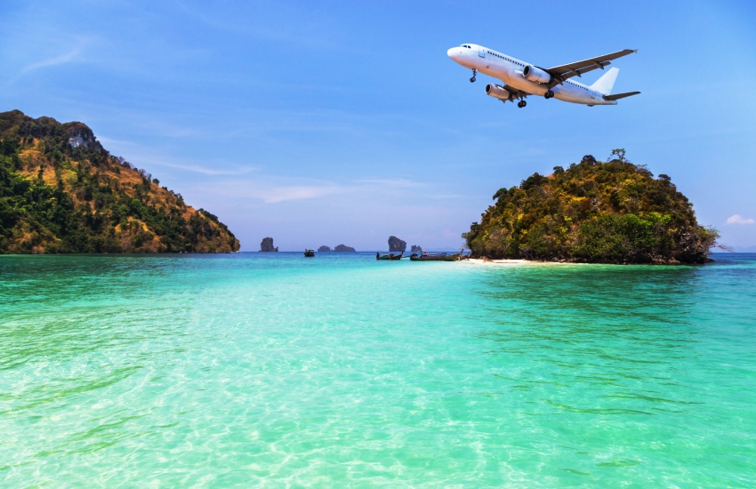 Scenic beach with turquoise water and palm trees in the Andaman Islands
